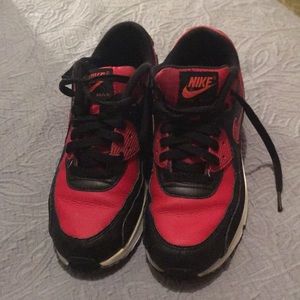 A red and black Air Max Nike size 7 Y